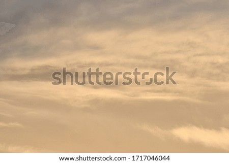 soft yellow cloudscape at sunset