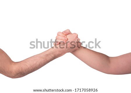 Two male hands gripping each other in a tight grip like an arm wrestling match against a white isolated background