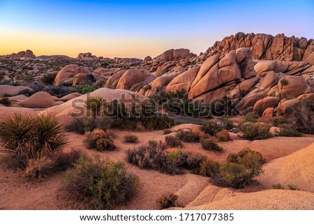 Sunset on the Jumbo Rocks, Joshua Tree National Park, California Royalty-Free Stock Photo #1717077385