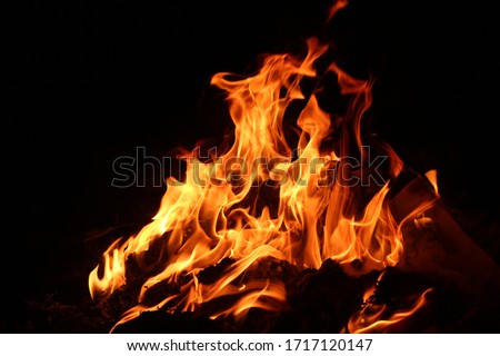 Heat energy heap closely, red and yellow, thermal energy at the fuel point during the night / lights on a black background Royalty-Free Stock Photo #1717120147