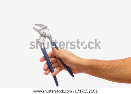 Hand holding pliers on a white background. These are Chanel lock pliers sometimes called water pump pliers. 