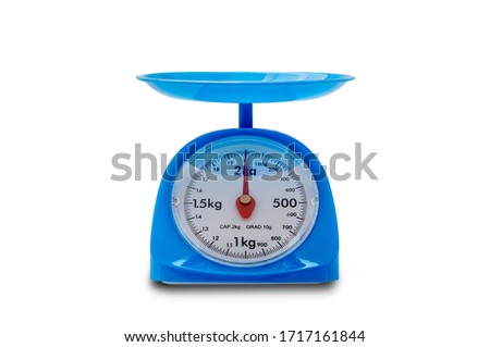 blue plastic kitchen scales isolated on white background with clipping path