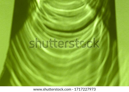Green background with round shadows and sparkles 
