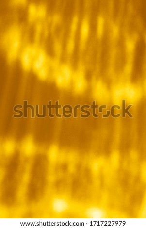 Yellow wavy background with sparkles 