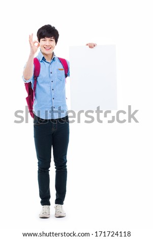 Asian young man showing pannel isolated on white background. 