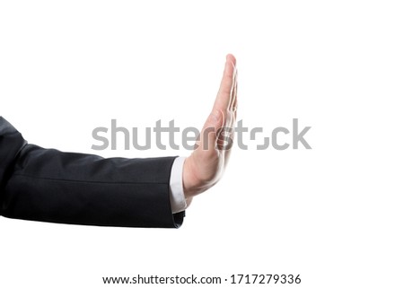 Businessman and gesture topic: a man in a black suit and white shirt showing shop hand gesture on an isolated white background in studio