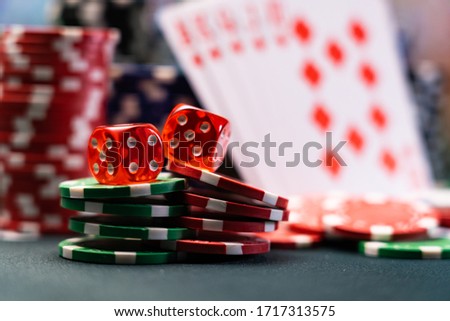 Casino table with cards and dices