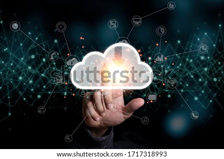 Hand touching to virtual artificial intelligence with cloud technology transformation and internet of thing .  Cloud technology management big data include business strategy , customer service. Royalty-Free Stock Photo #1717318993