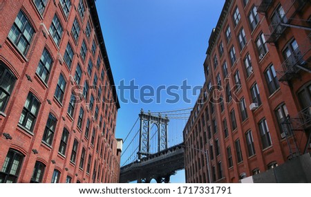 View from Washington street, Dumbo Brooklyn of The Manhattan Bridge at sunset. New York, USA