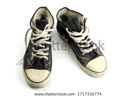 Sneakers old dirty grunge isolated on white Royalty-Free Stock Photo #1717336774