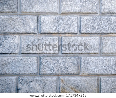 light grey marble blocks wall, natural material seamless background