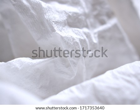 Closeup  macro white tissue paper , abstract background, soft focus ,bright wallpaper for card design
