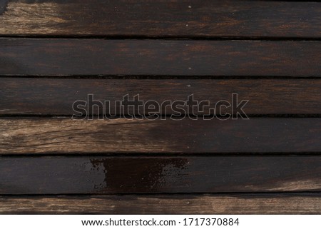 raining on wet wooden floor