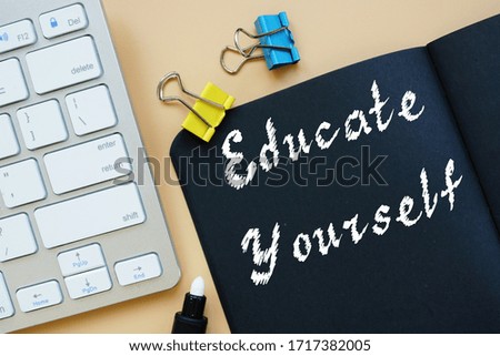 Educational concept about Educate Yourself with sign on the piece of paper.