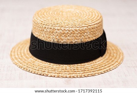 straw boater hat (basher, skimmer, The English Panama, cady, katie, canotier, somer, sennit hat,can-can hat) Royalty-Free Stock Photo #1717392115