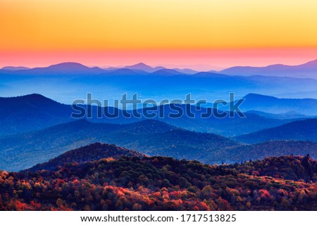 Sunset over the blue ridge Appalachian mountains in North Carolina. Royalty-Free Stock Photo #1717513825