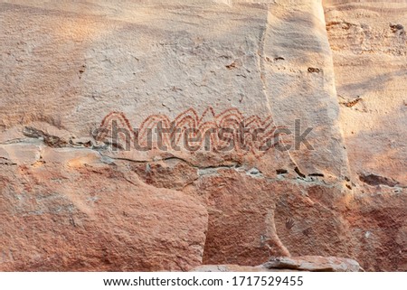 Ancient drawing on the mountain wall in Ubon Ratchatani, Thailand