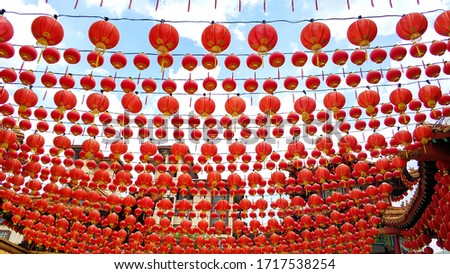 Festive New year decorations with Chinese red lanterns of the Chinese temple.