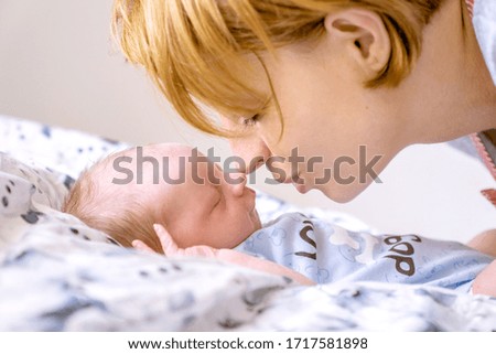 Mother and her child A moment after birth