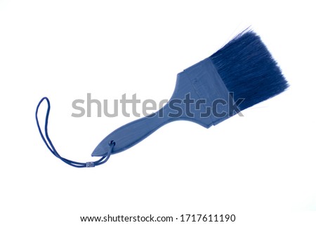 Matte black paint brush, isolated on a white background.