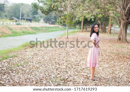 Asian woman take picture on field show travel nature concept