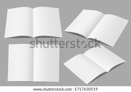 Leaflet folded white paper really,
Fold in half,Open leaflet in square format.Empty paper sheet in A4 size isolated on gray background. Flat ray papers ,studio shot
