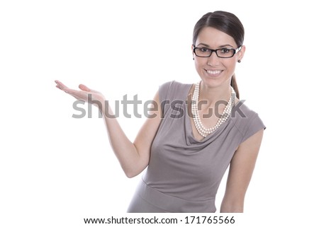 Isolated happy business woman is presenting something with her hands.