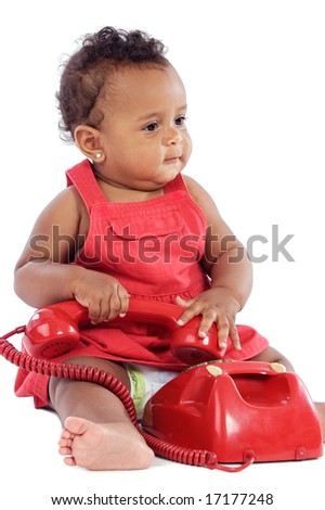 Baby with red phone a over white background