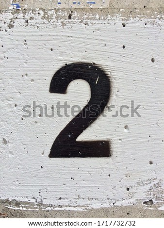 black number 2 on wall background