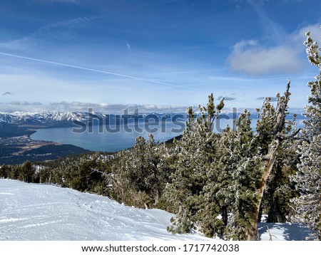 Heavenly ski resort, California / Nevada. Beautiful mountain covered with snow and a view of the blue Tahoe Lake. Scenic view of south lake Tahoe.