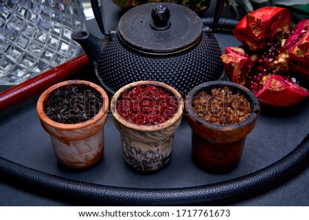 Close-up view of Eastern hookah tobacco of different flavors 