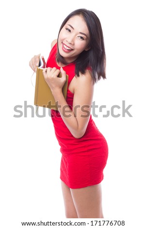 Woman in red dress with notebook