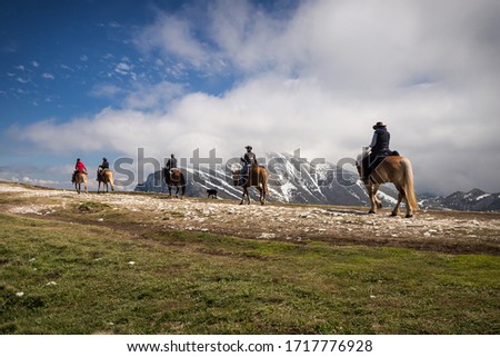 Horse riders on the Montebaldo mountain, Malcesine, Italy