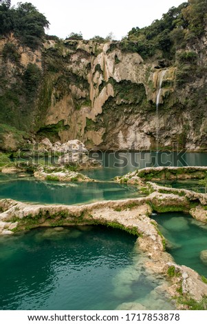 Vertical shot of the landscape of the waterfall El Salto and is natural pools with turquoise water Huasteca Potosina 