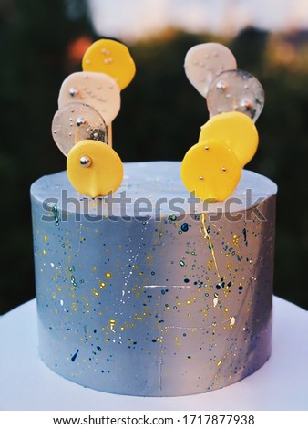Cake with white and yellow candies
