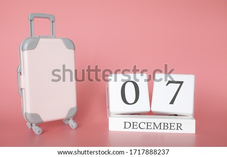 Calendar wooden cube. December 07, time for a winter holiday or travel, vacation calendar
