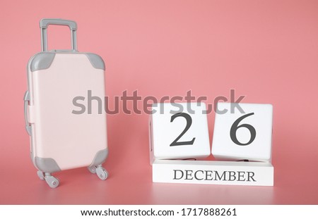 Calendar wooden cube. December 26, time for a winter holiday or travel, vacation calendar