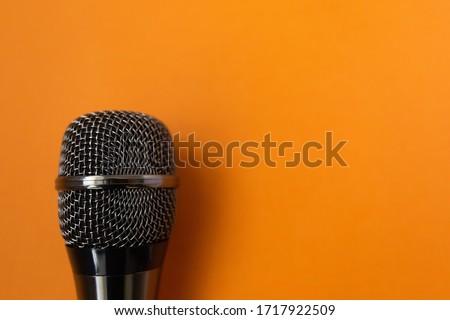 the musical mycraphone on an orange background
