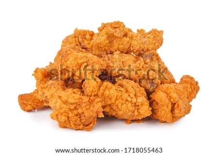 Heap of fried spicy chicken isolated on white background. Royalty-Free Stock Photo #1718055463