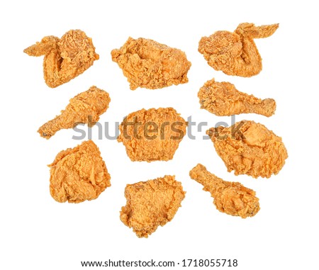 Set of fried chicken isolated on white background. Top view Royalty-Free Stock Photo #1718055718