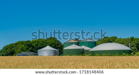 Biogas plant for power generation and energy Royalty-Free Stock Photo #1718148406