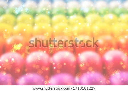 Blurred rainbow background with natural bokeh light stars. Abstract heavily blurred rainbow background with numerous colourful bright festive bokeh. Texture with copy space for text