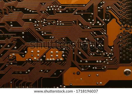 Closeup on electronic devices on boards, background images. Electronic board for computer and electronic control units. Card with integrated circuit and other electronic components.