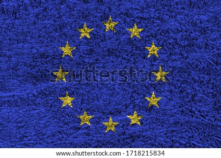 European Union flag on foil texture. Abstract background for design.