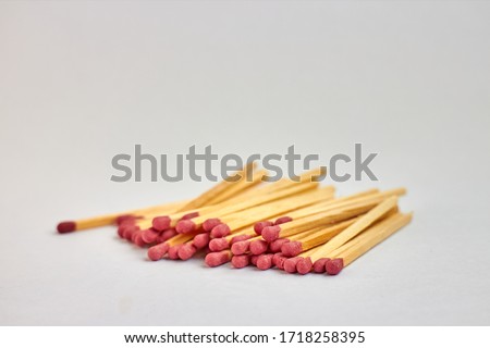 scattered matches on white background