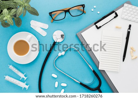 Medical workspace with coffee cup