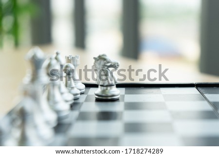 Blurred chess business on the office background. Leader and success concept