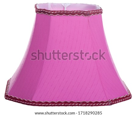 classic cut corner bell shaped purple pink tapered lampshade on a white background isolated close up shot