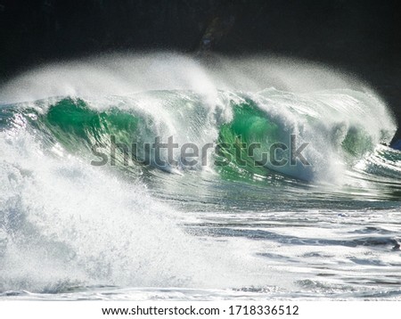Waves, waterfall, surf barrels, sky and nature of Brazilian beach 