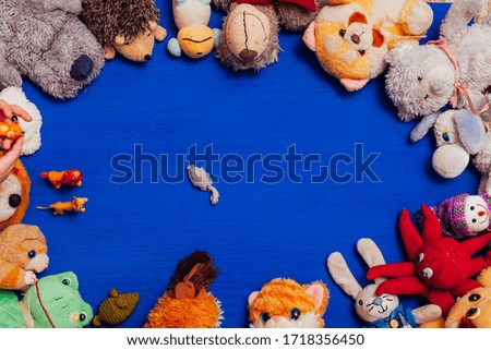 children's soft toys for developing games on a blue background